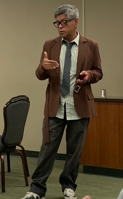 Higinio discussing Sofia at luncheon