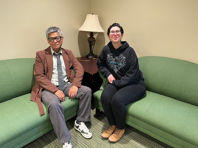 Higinio and Sofia sitting on a couch