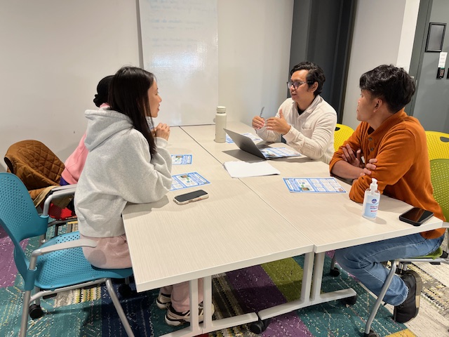 Andre Payadnya presenting Andre Payadnya presenting in small group