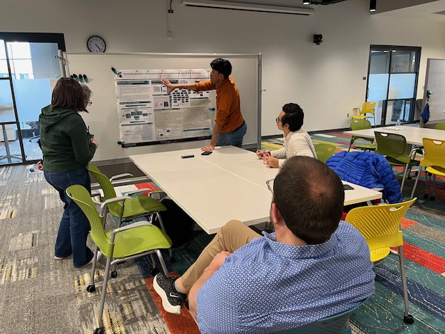 Ahmad Wachidul Kohar presenting research