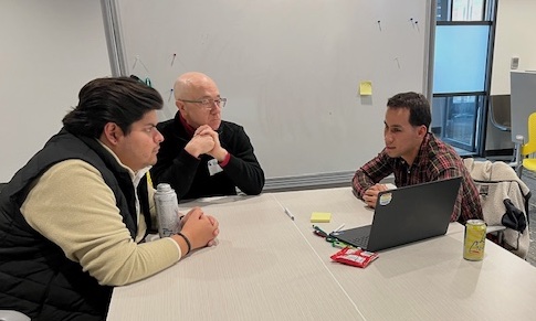 Miguel Rodriguez Mejia presenting research Miguel Rodriguez Mejia presenting research to small group