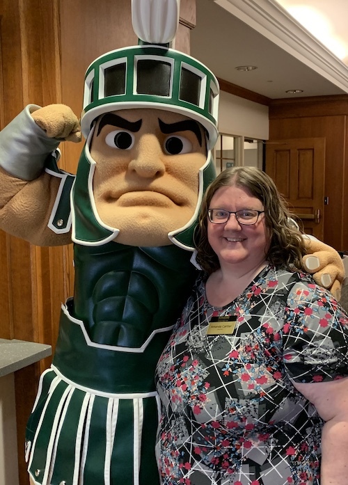 Amanda Cartter with Sparty mascot