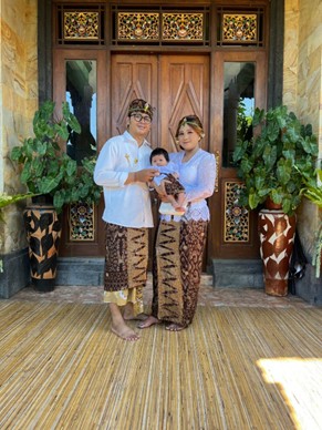 Andre with family in traditional attire