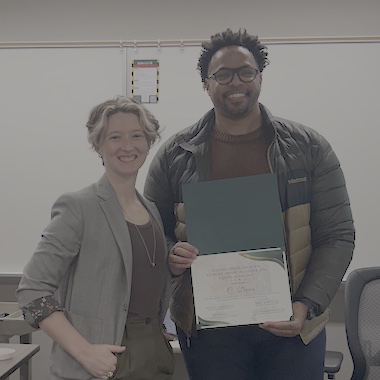 Davis receiving award from presenter.