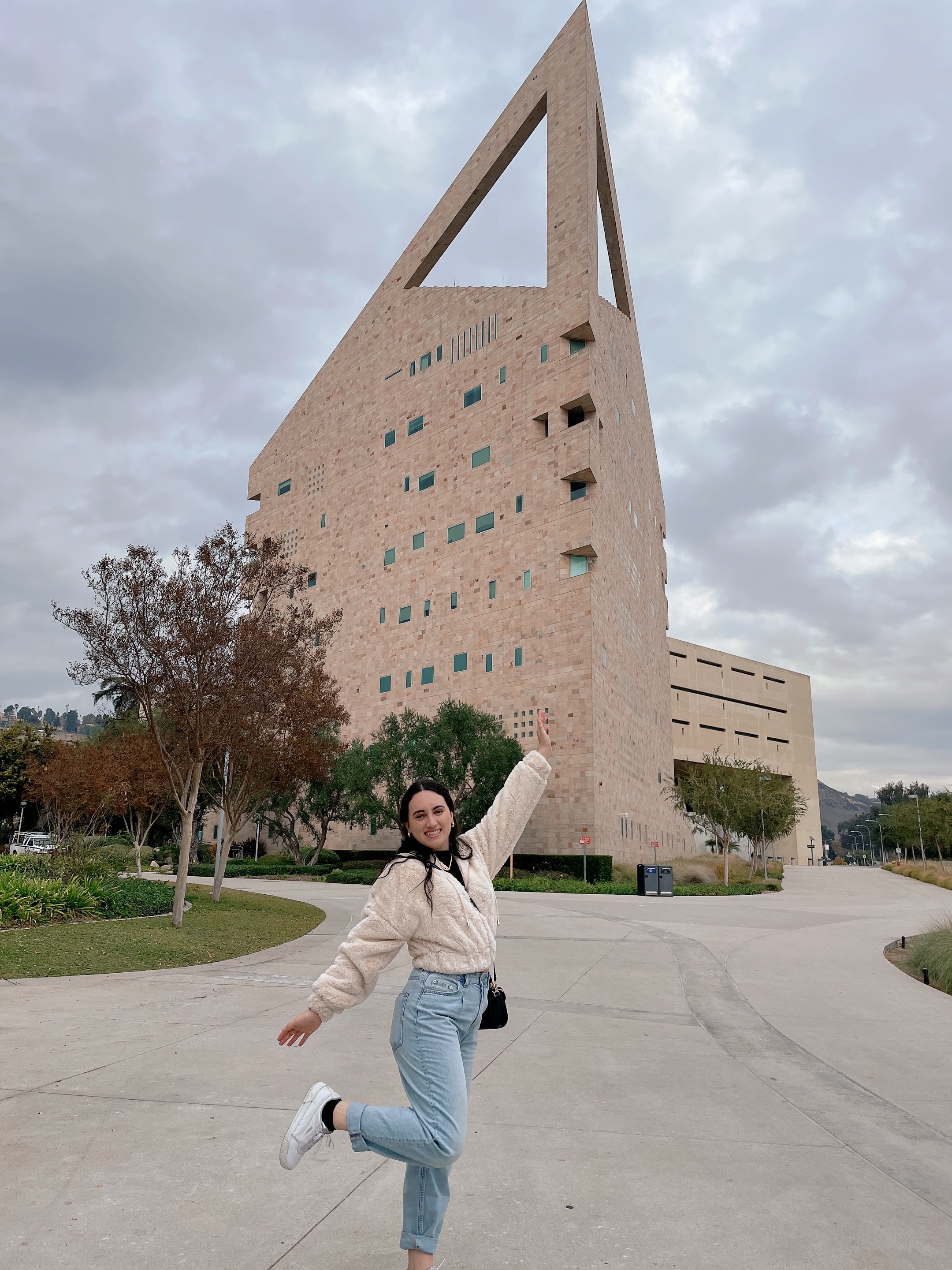 Sara Elakesh in front of building