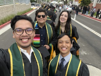 Ricarte graduating with friends